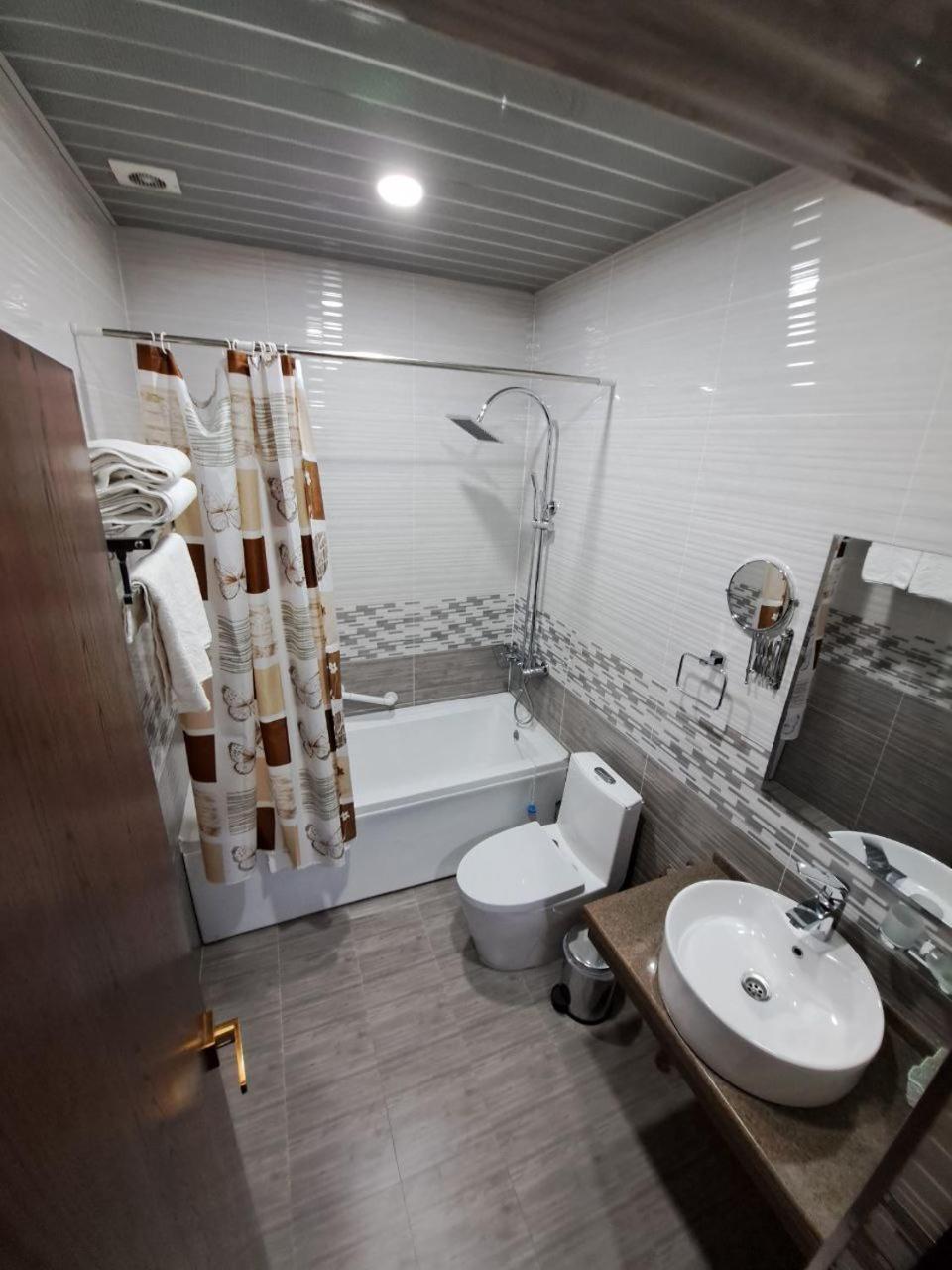 Caravan Plaza Inn Boutique Бухара Екстер'єр фото